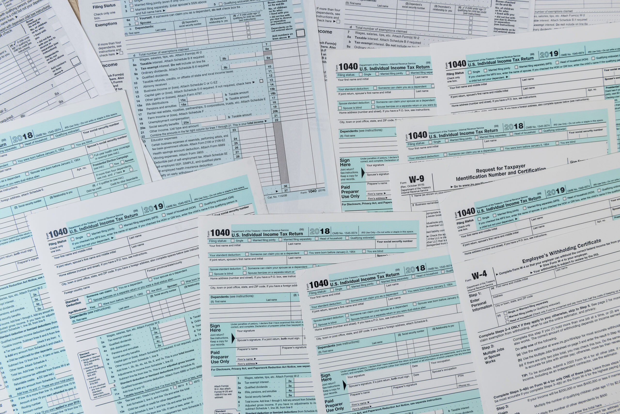 1040 tax form close up on desk. tax time. taxes concept.